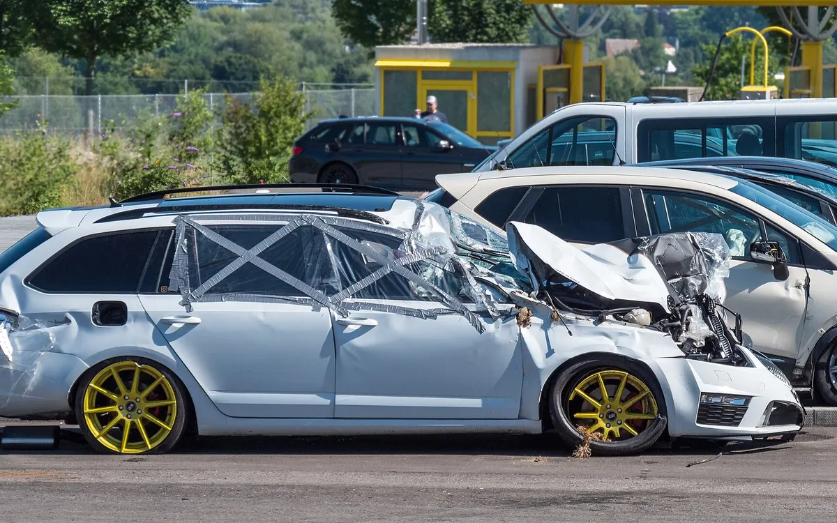 Estate car with front-end accident damage